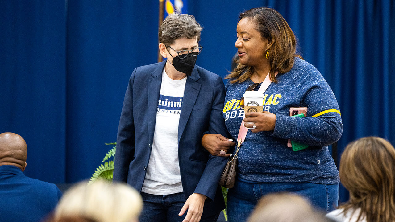 Debra Liebowitz walks with Elicia Spearman