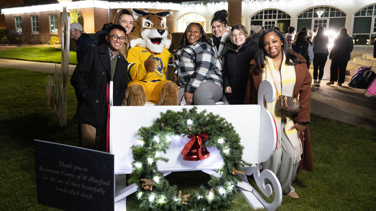 Group photo with Boomer in sled