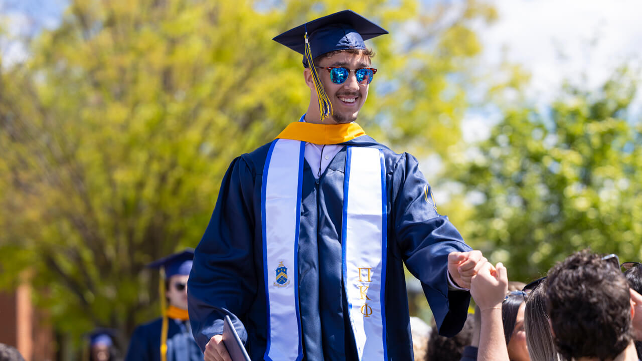 Student looks into the crowd