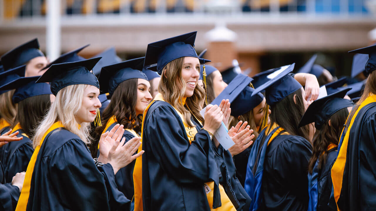 Health science graduates join in a round of applause during the Commencement ceremony.