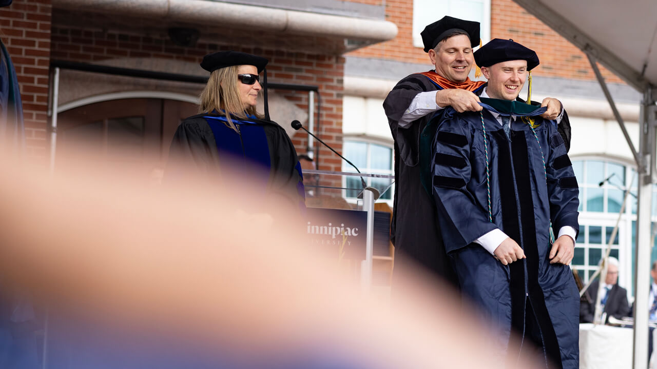 Student receives hood