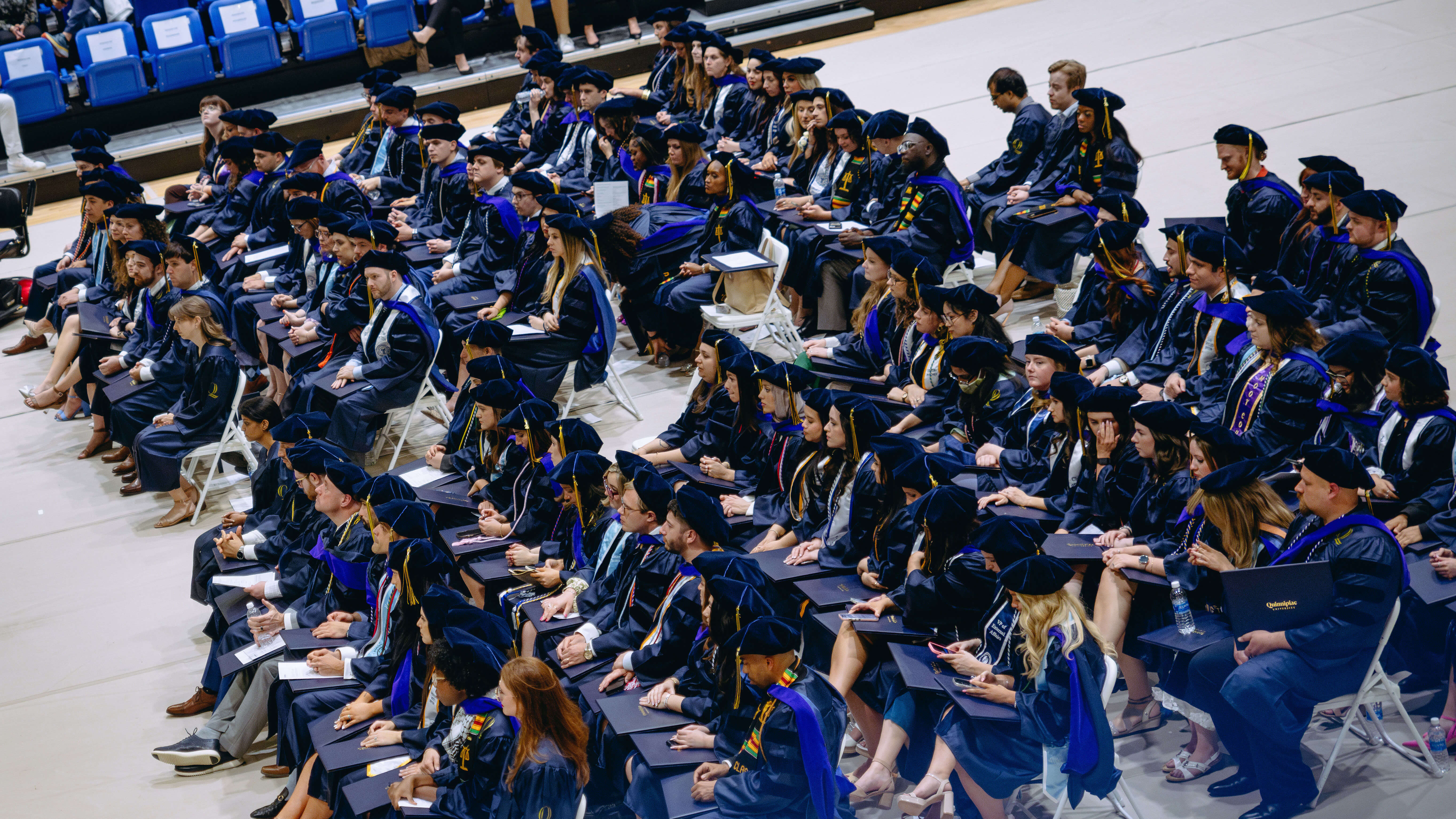 Class of 2024 School of Law students sitting in chairs