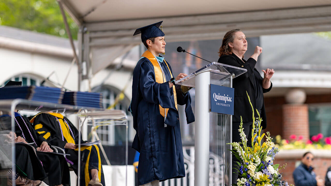 graduate speaker addresses the audience