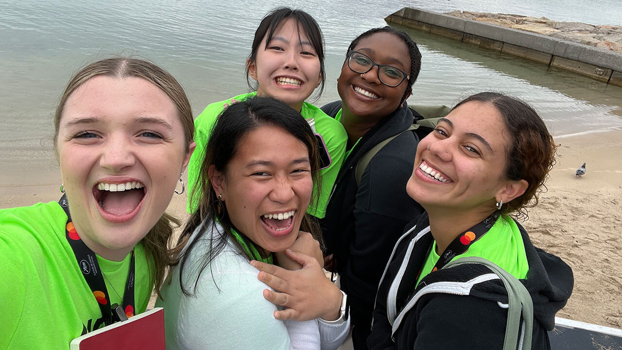 A group of students take a photo together while abroad