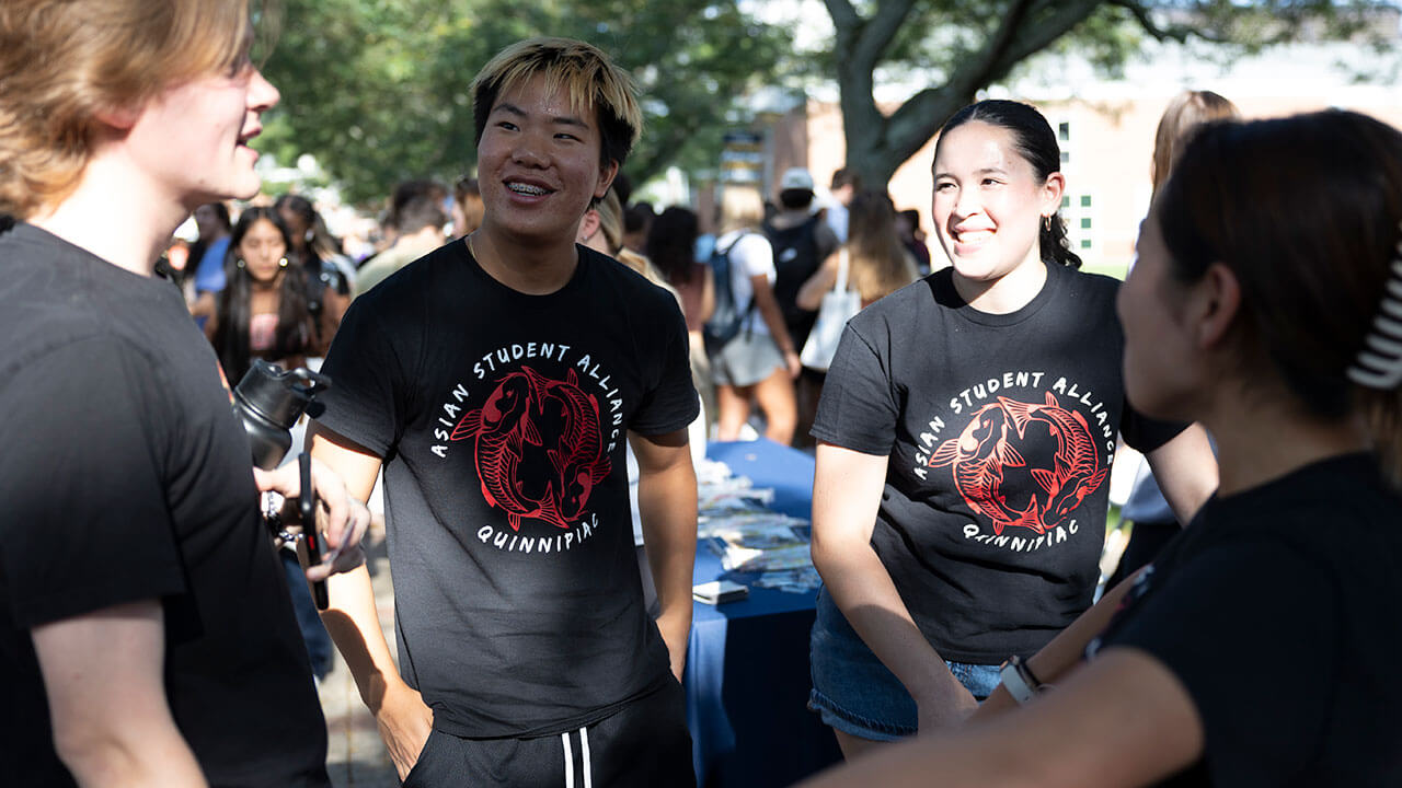 Students from the Asian Student Alliance chat with new students