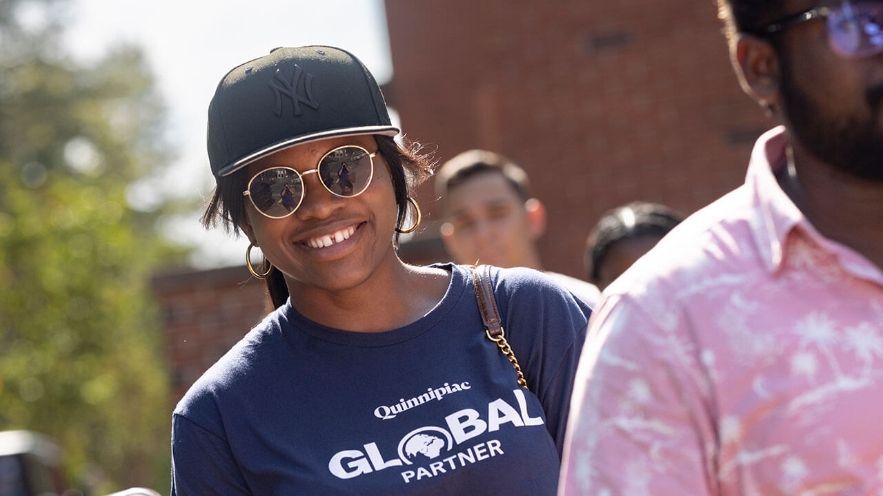 Global fellow smiles during International Orientation