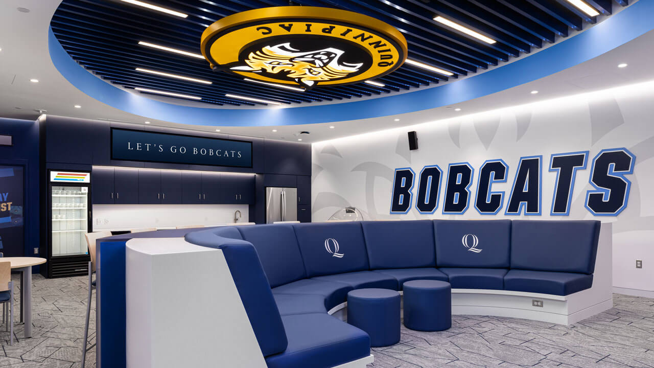 Side view of the couch in the women's ice hockey locker room.