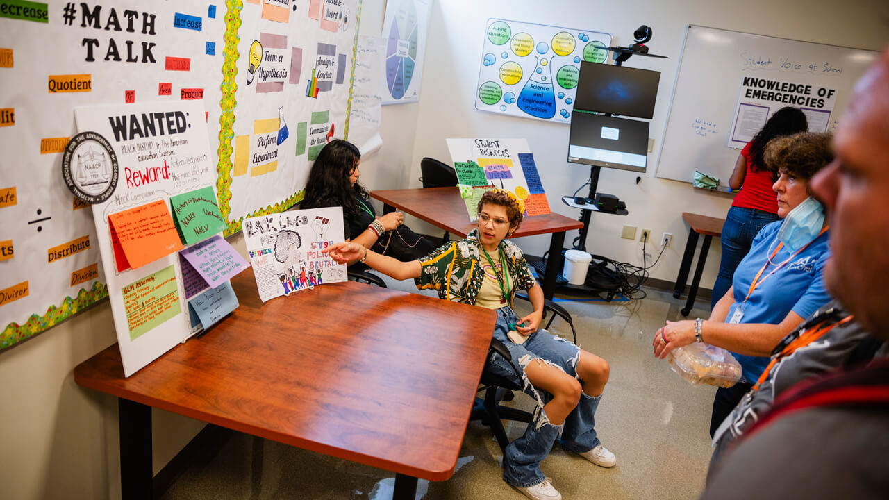 QUADS student presents their project at the Quest for Questions event at the North Haven campus.