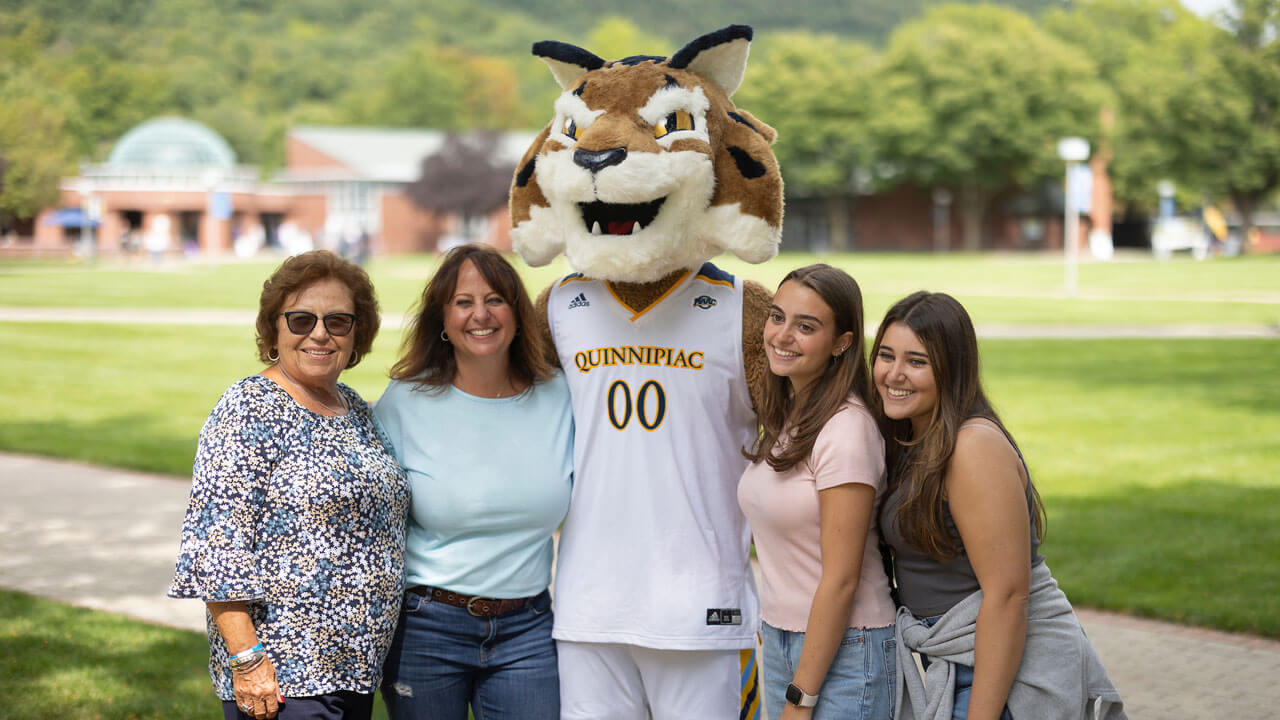 Family taking a photo with Boomer