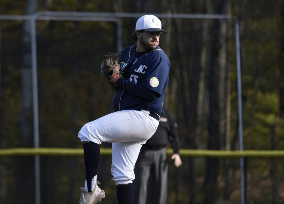 A club baseball player gets ready to pitch