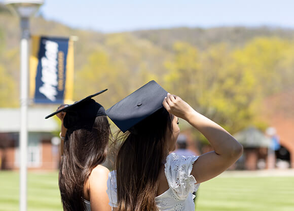 Graduates looking at the Quad.