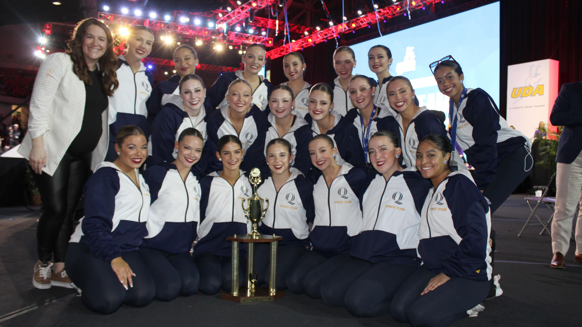 The Quinnipiac dance team with their trophy