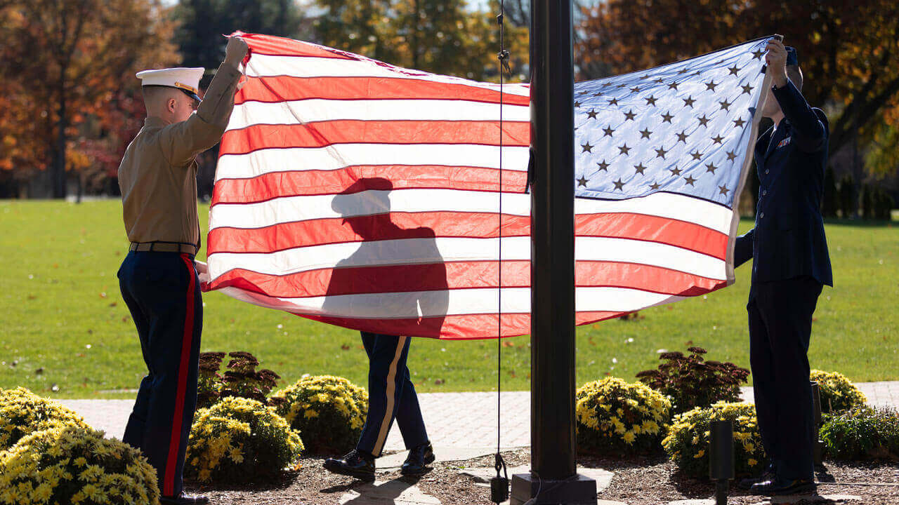 Flag held by veterans