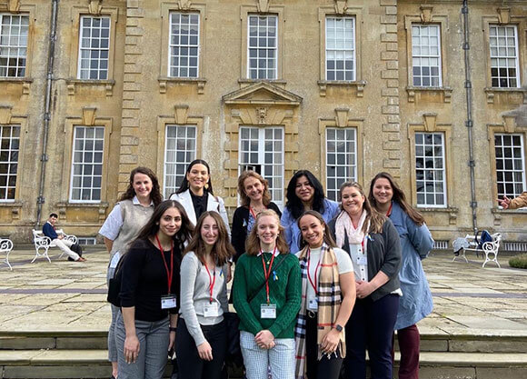 A group of students in front of the Oxford Consortium of Human Rights