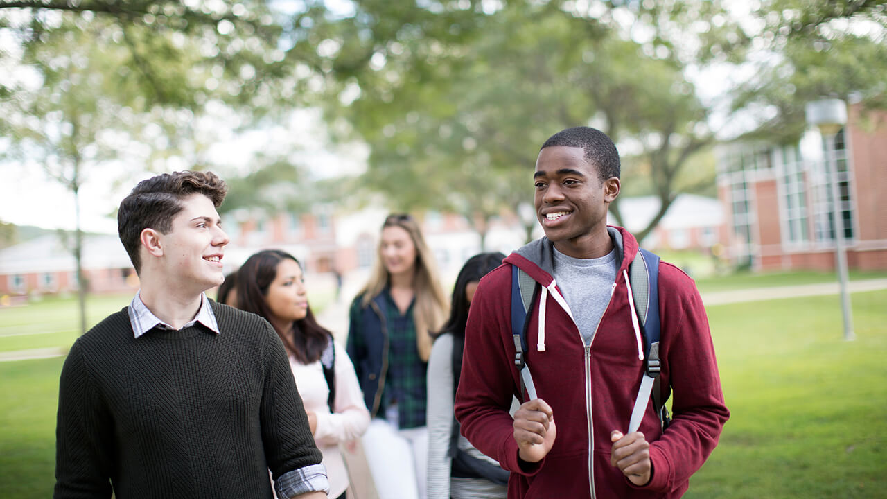 Students walk across the Quad.