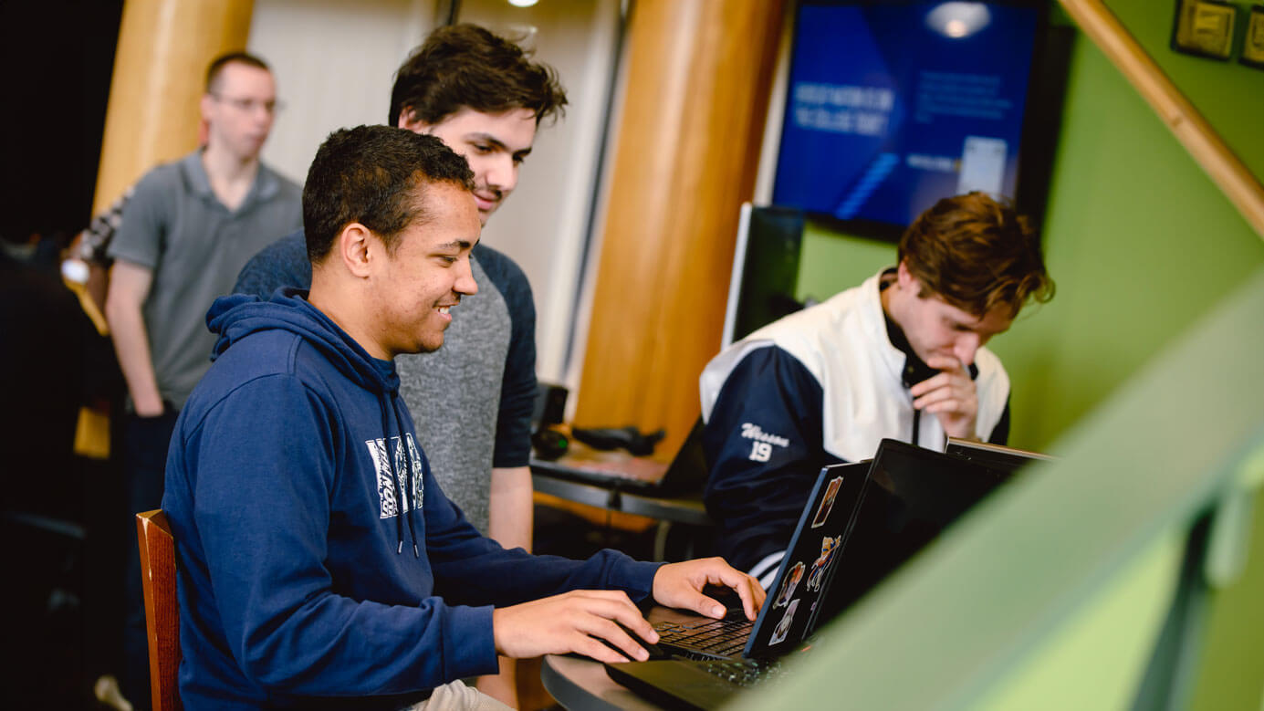 Game design and development tudents play computer games.