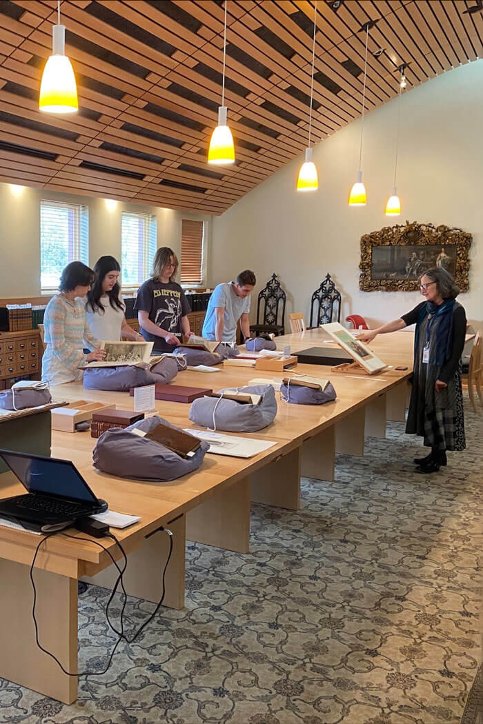 Students explore the Walpole Library.