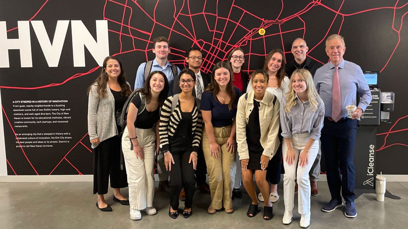 Governor Ned Lamont with student members of The Agency at CT Innovation.