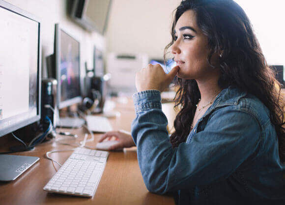 A student pays a tuition bill using a computer