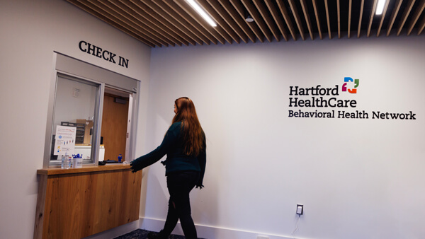 A student checks in to counseling services on the Mount Carmel Campus