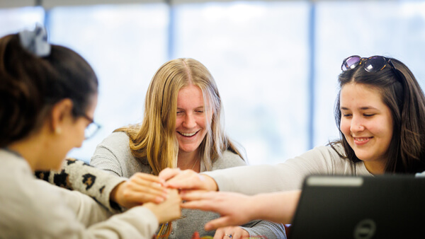 Nursing and health sciences students collaborate together in a team event