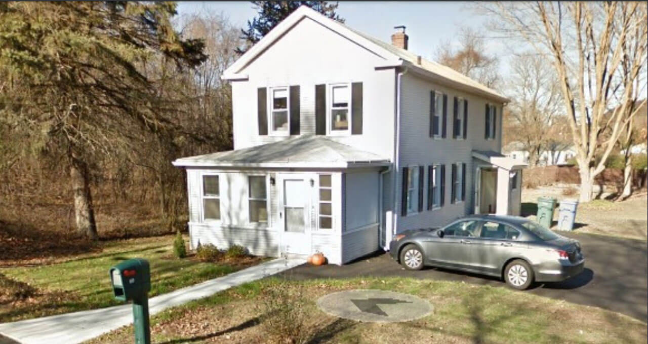 A walkway leading up to house door and driveway on 60 Woodruff Street