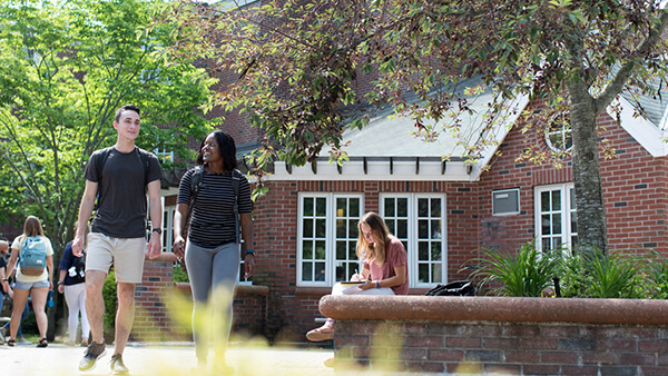 Students walk across campus