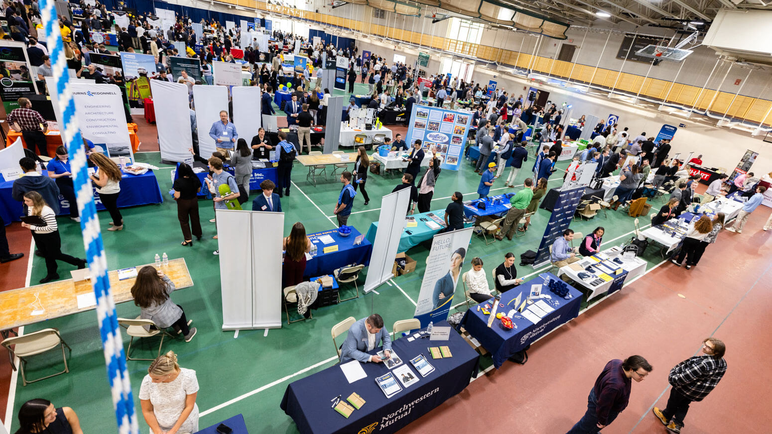 Students attend the Quinnipiac University career fair networking event.